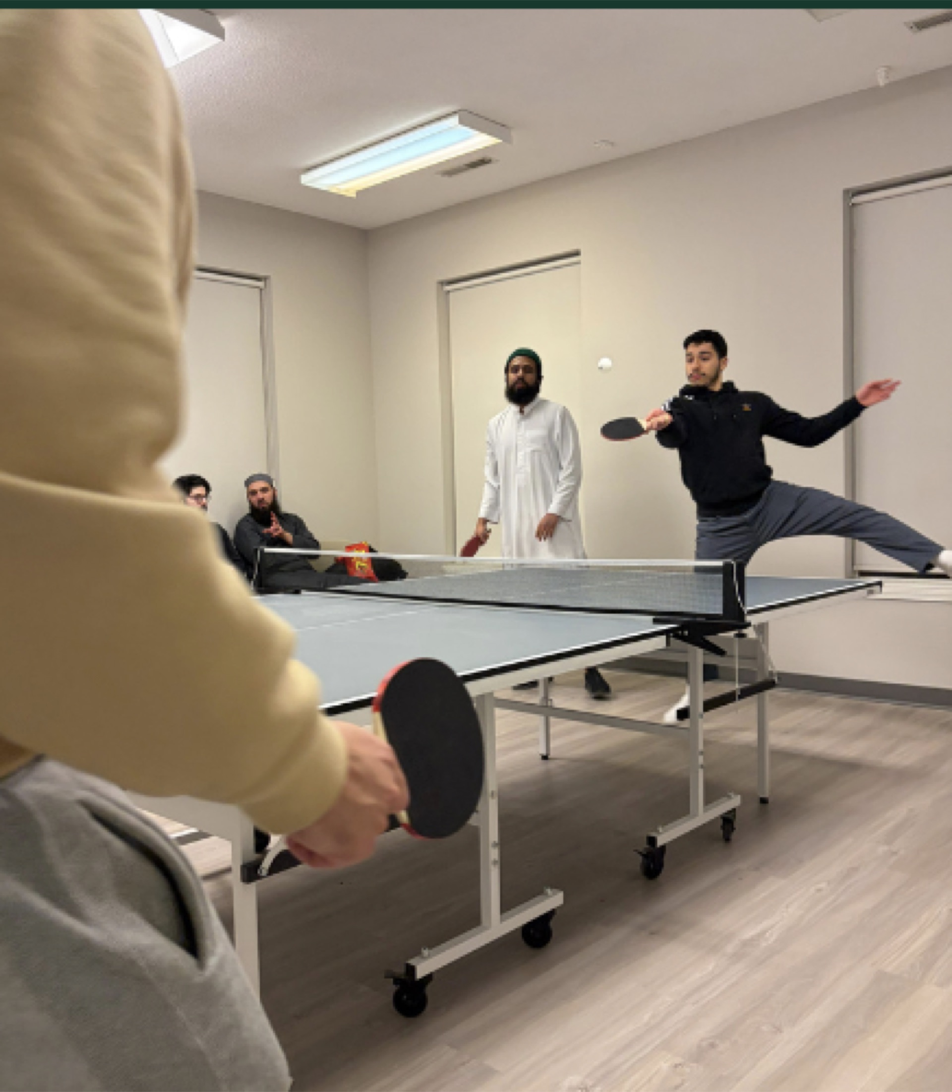 Brothers at a casual Najm gathering